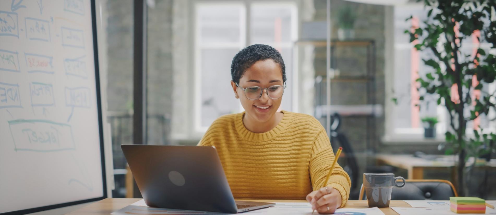 Video editor reviewing footage on professional editing workstation