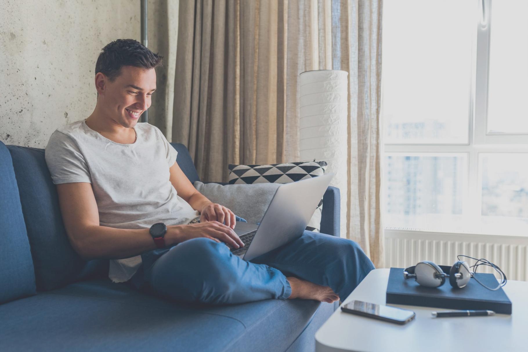 Cinematographer adjusting camera settings on location shoot